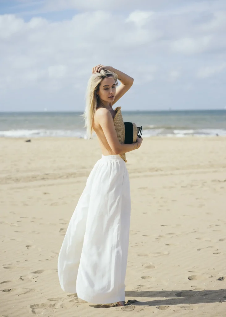 artistic portrait photography of a woman on the beach made with retro photography lens