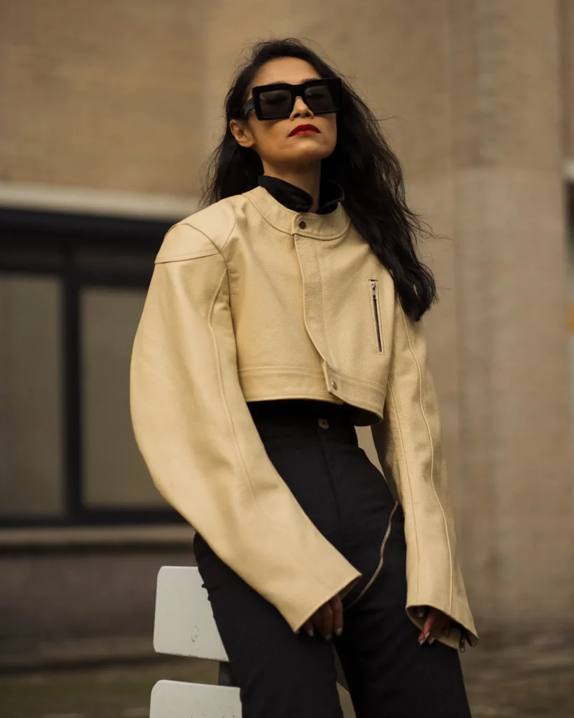 artistic portrait photography of a woman in a beige pastel colours