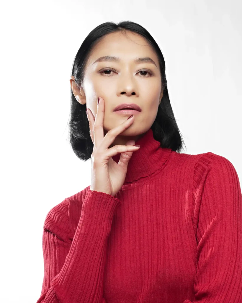 artistic portrait photography of a woman made in the studio with retro photography lens