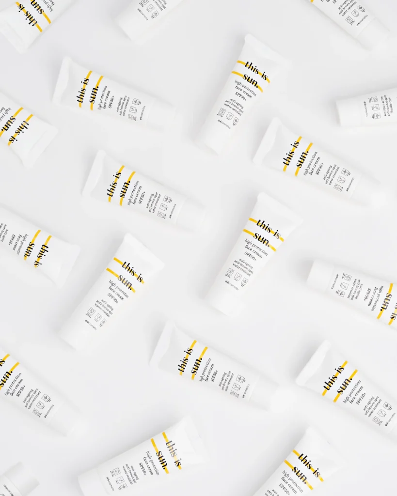 creative still life close up photography of sun cream on the white background hectic layout