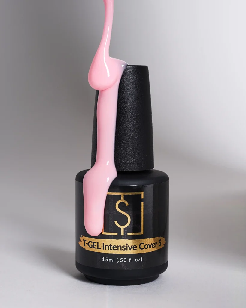 creative still life close up photography of nail polish bottle on the grey background with gel drop on the bottle