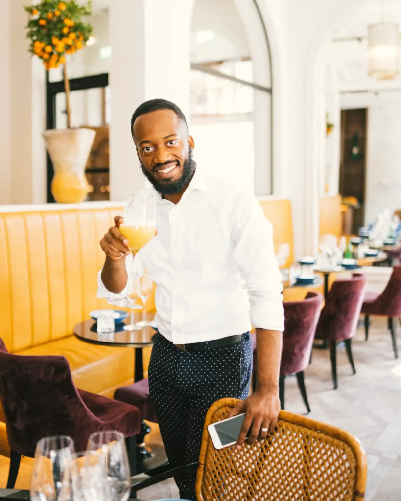 personal branding photography of an influencer enjoying the time in a restaurant