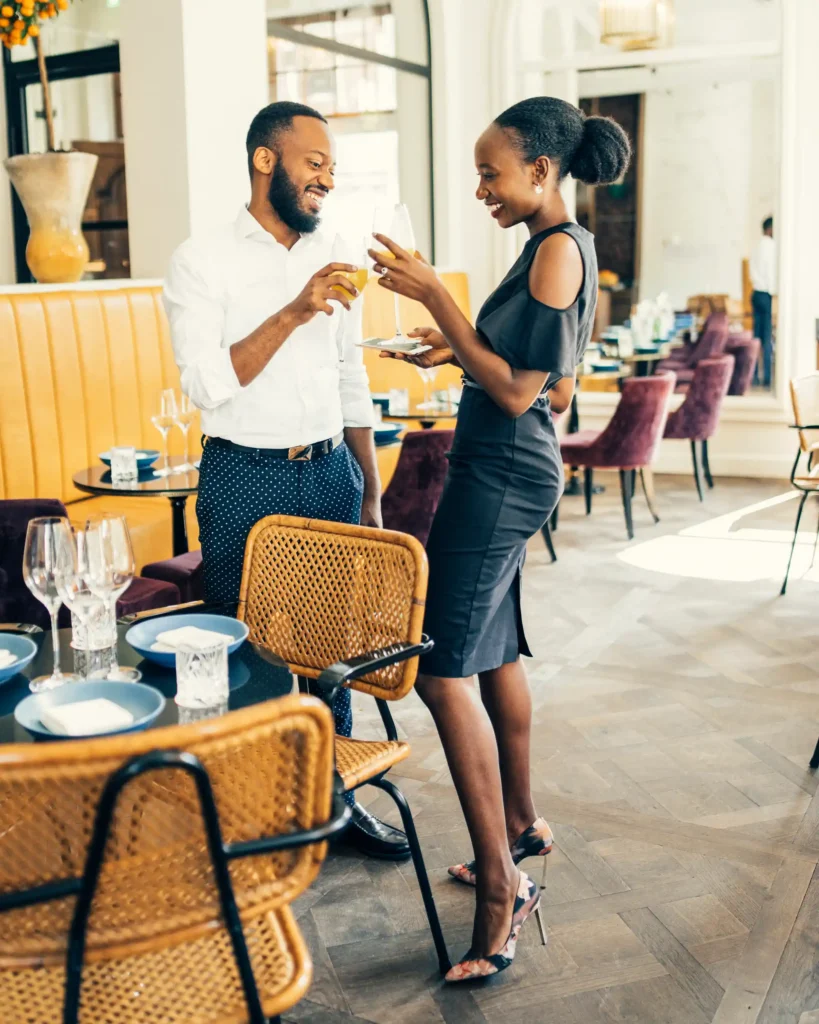 personal branding photography of an influencer with husband enjoying the time in a restaurant