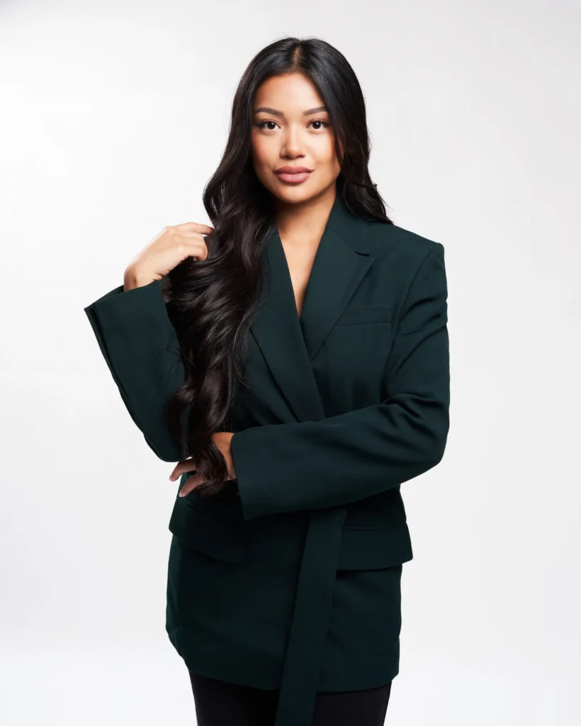 studio photography of a woman on the white background in a dress made for the instagram page